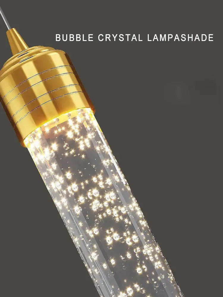 Golden-finished cylindrical bubble crystal lampshade with embedded led lights in decorbites crystal chandelier for foyers