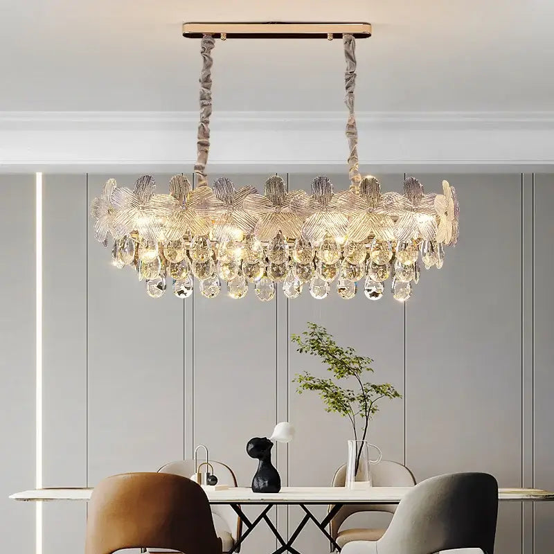 Elegant gold-toned decorbites crystal chandelier with intricate crystal flower and teardrop designs for living room and bedroom