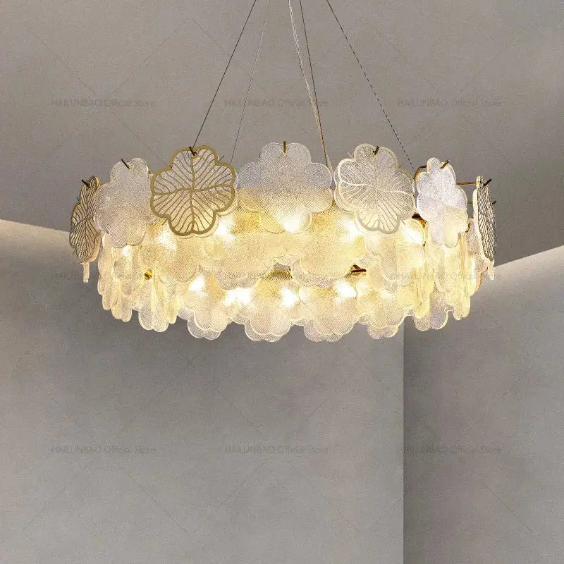 Elegant decorbites crystal chandelier with translucent layered flower-shaped glass and gold leaf accents for luxury lighting