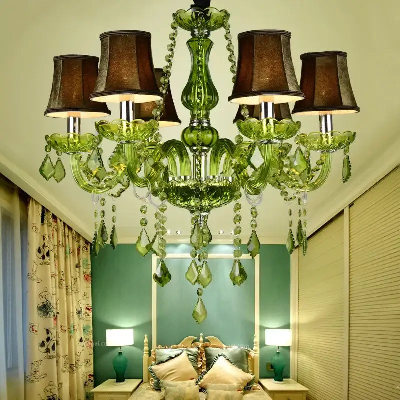 Emerald green decorbites crystal chandelier with dangling crystal droplets and dark brown lampshades for elegant spaces