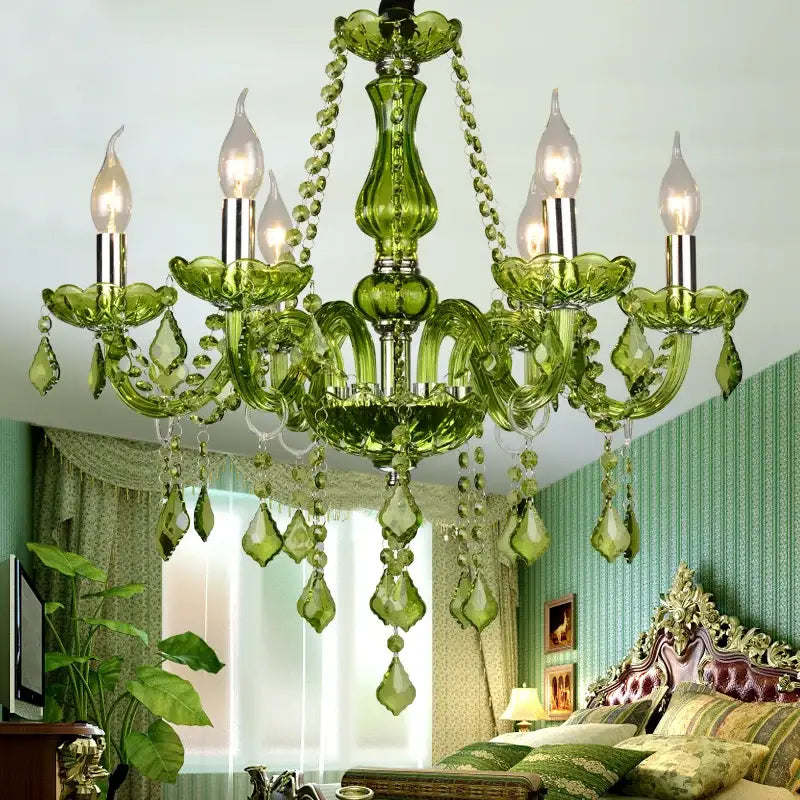 Emerald green decorbites crystal chandelier with crystal droplets and metallic accents for elegant lighting