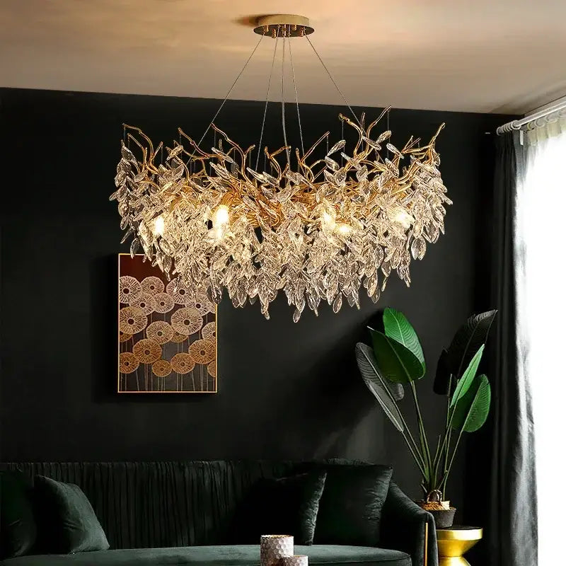 A golden leaf-shaped decorbites crystal chandelier with clear crystal accents hanging from ceiling for dining room