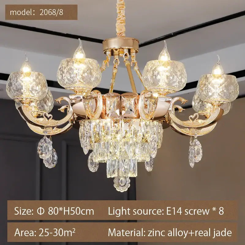 Gold-toned decorbites crystal chandelier with jade accents and teardrop pendants for elegant living room or restaurant use