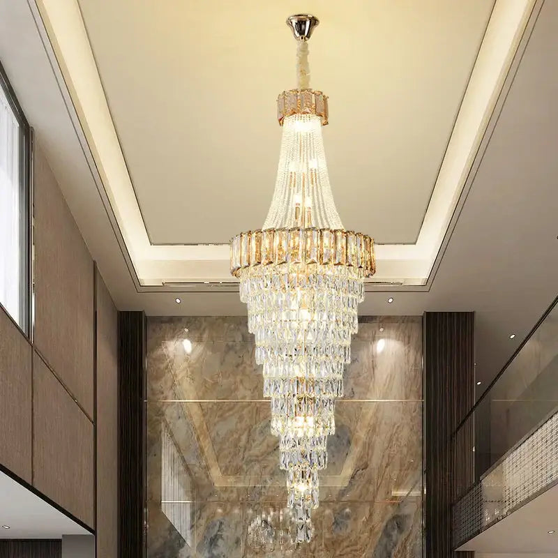 Decorbites crystal chandelier multi-tiered with gold-toned accents and polished chrome fixture for luxury duplex lighting