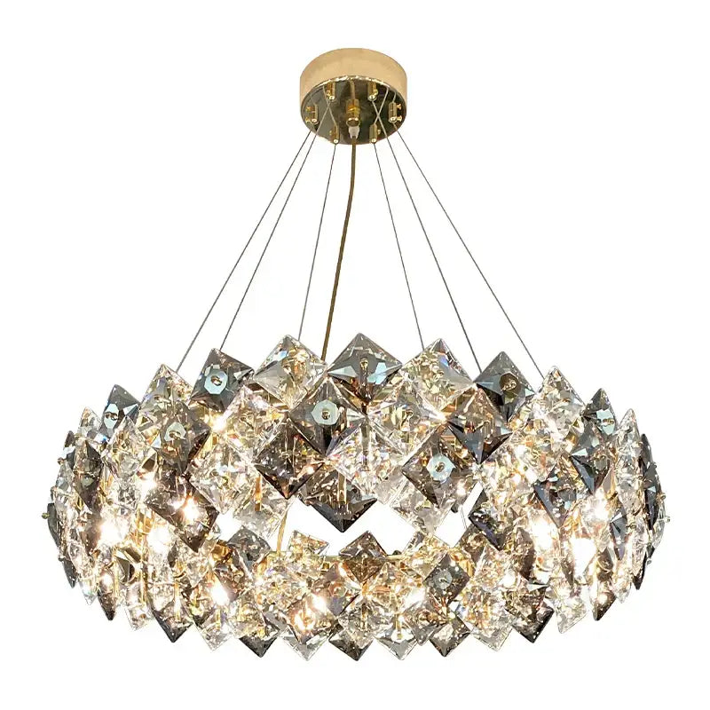 A modern decorbites crystal chandelier with faceted crystal prisms and gold-tone LED pendant for living room use