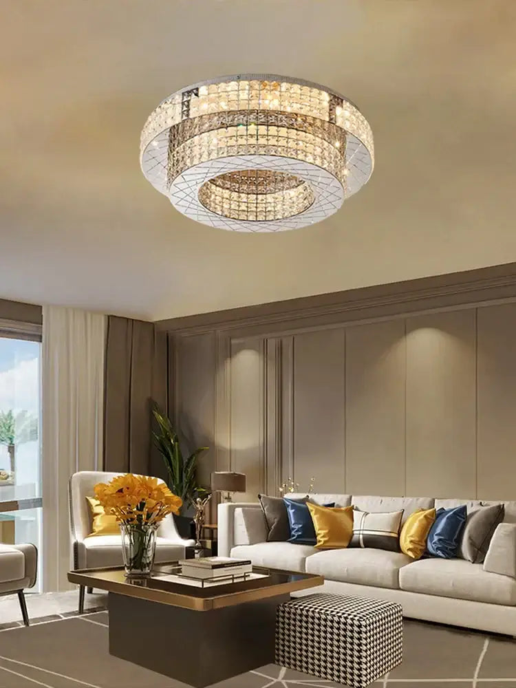 Decorbites crystal chandelier with circular concentric rings and metallic frame for dining room lighting
