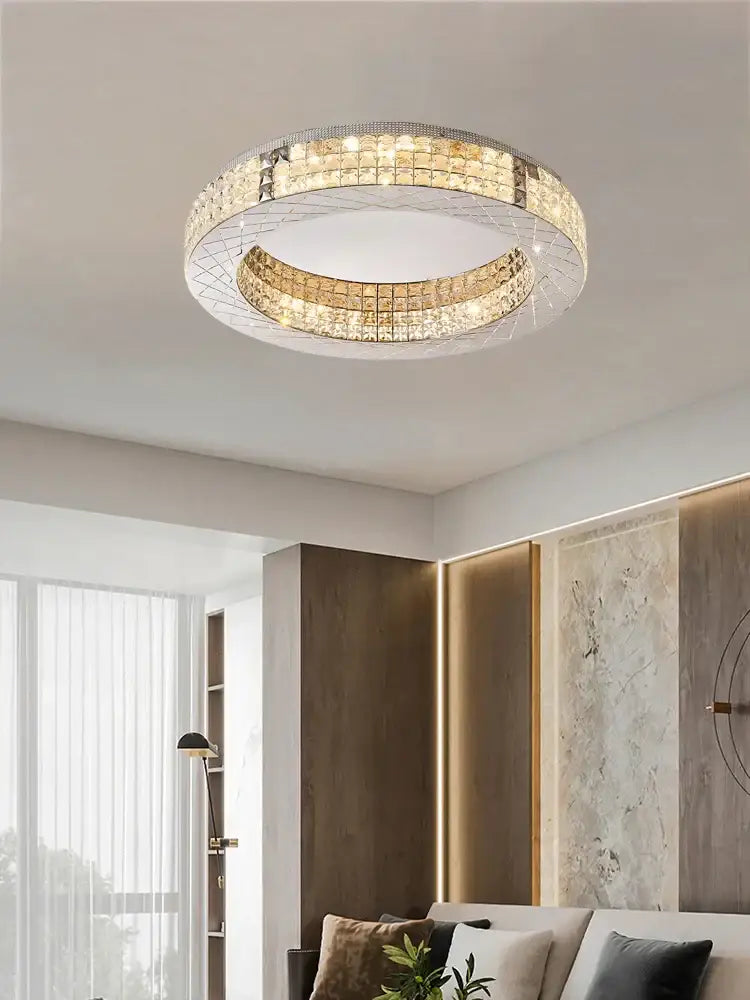 Circular decorbites crystal chandelier with clear and gold crystal rings in metallic frame for dining room lighting
