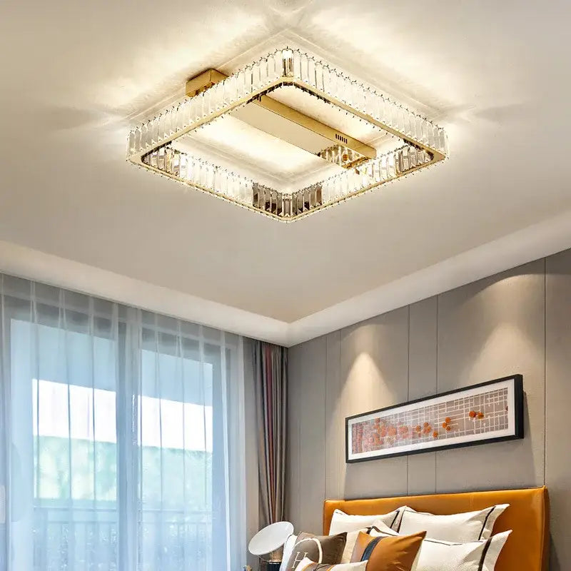 Square decorbites crystal chandelier led ceiling light with gold-finished frame and illuminated center for bedroom lighting