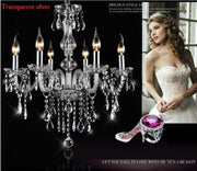Transparent silver decorbites crystal chandelier with crystal droplets and candle-style LED bulbs for modern indoor decor