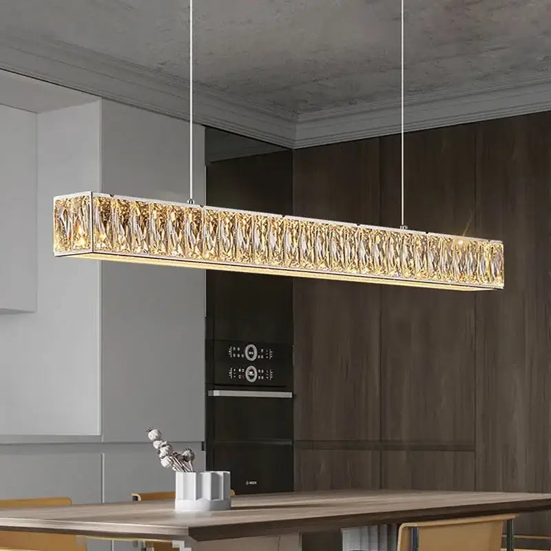 A modern luxury decorbites crystal chandelier led with gold-toned textured crystals and silver metal frame ceiling light