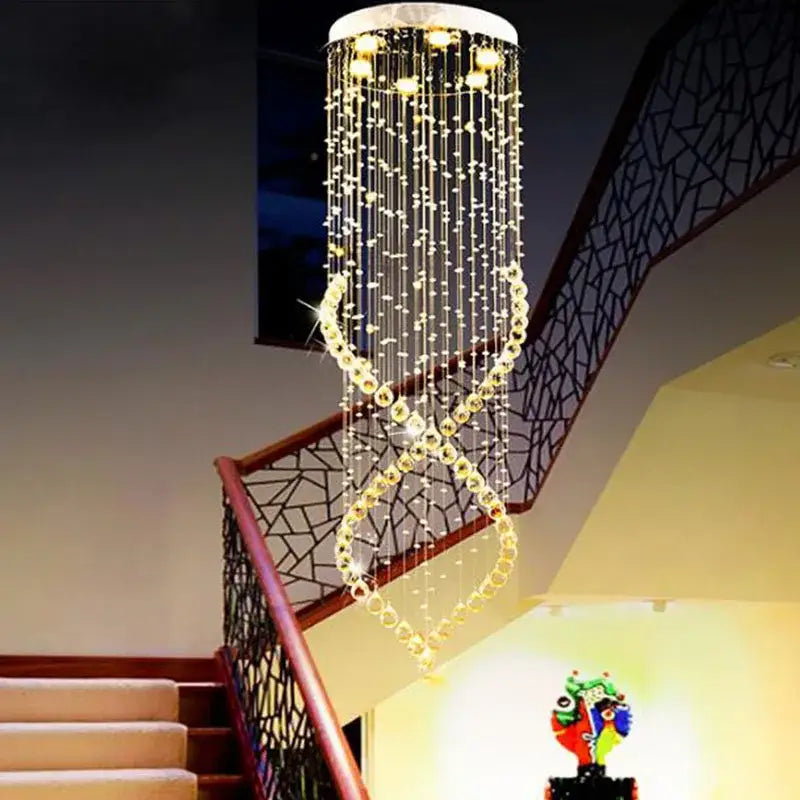 A sparkling gold-toned decorbites crystal chandelier with cascading strands for villa hall stairs lighting