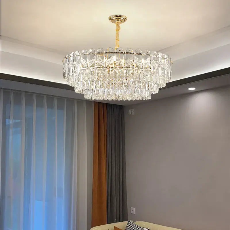DecorBites crystal chandelier with gold-toned mount and faceted glass crystals for modern luxury restaurant lighting