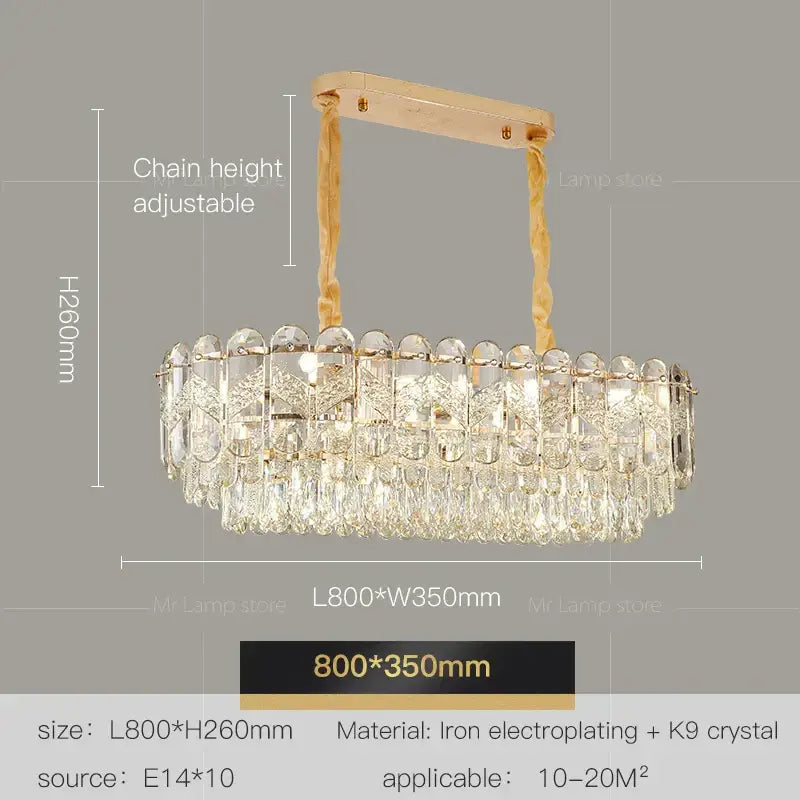 A modern decorbites crystal chandelier with an oval gold-toned iron electroplated frame and cascading k9 crystal droplets