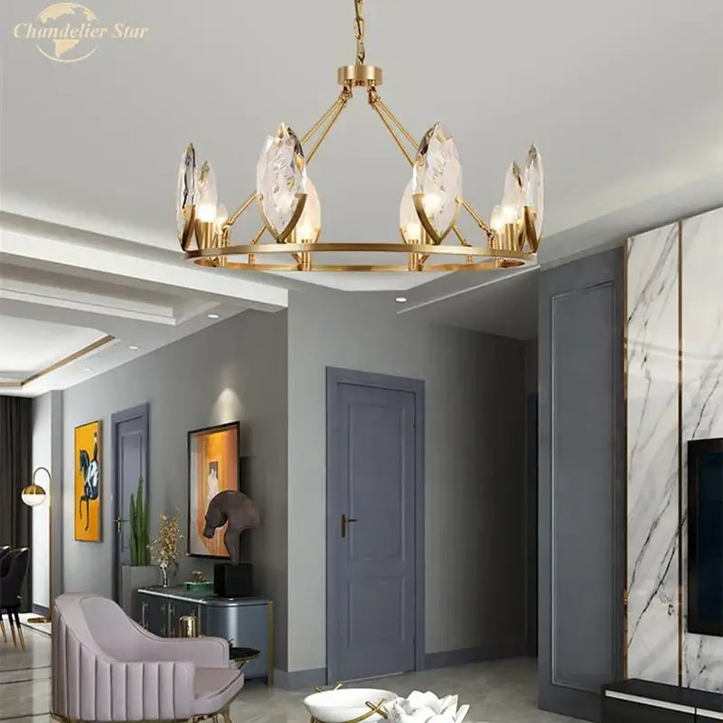 Gold-toned decorbites crystal chandelier with clear crystal accents for elegant and luxurious living spaces lighting