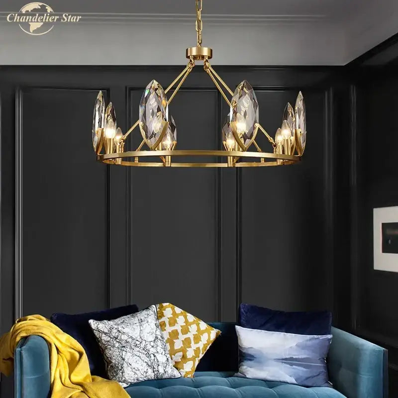 Gold-toned decorbites crystal chandelier with clear crystal pendants and circular frame for luxurious living spaces lighting