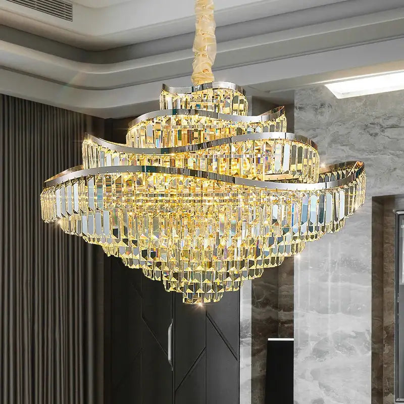 Golden decorbites crystal chandelier led lighting with layered curved metallic frames and cascading faceted crystals for luxury rooms