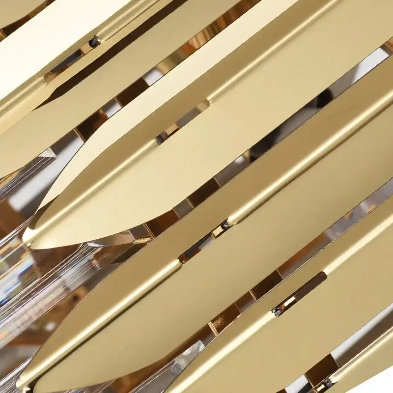 Gold-toned metallic leaf pendant light with clear crystal accents from decorbites crystal chandelier for luxury decor
