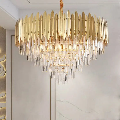 A luxurious gold-toned decorbites crystal chandelier pendant light with cascading prisms for luxury living room décor