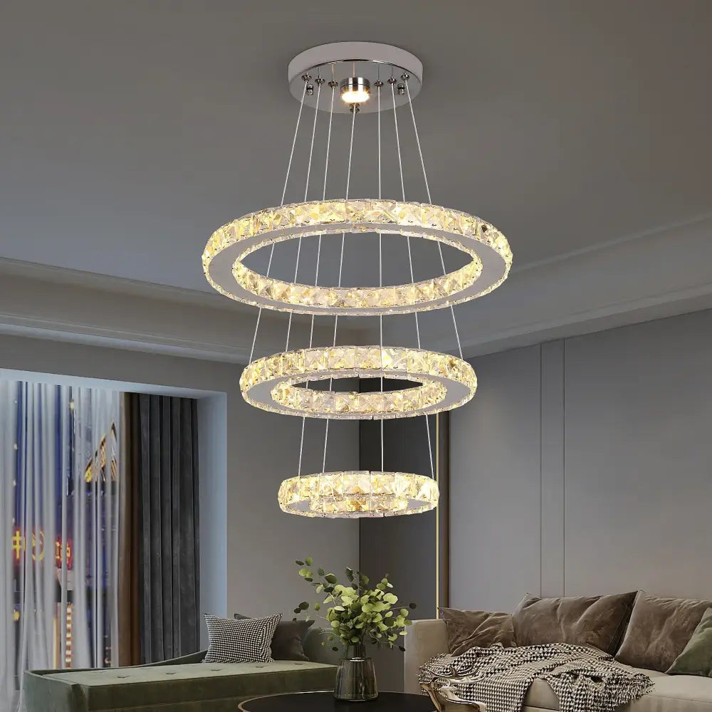 Modern three-tiered DecorBites crystal chandelier led pendant with chrome finish and clear faceted crystals for living room