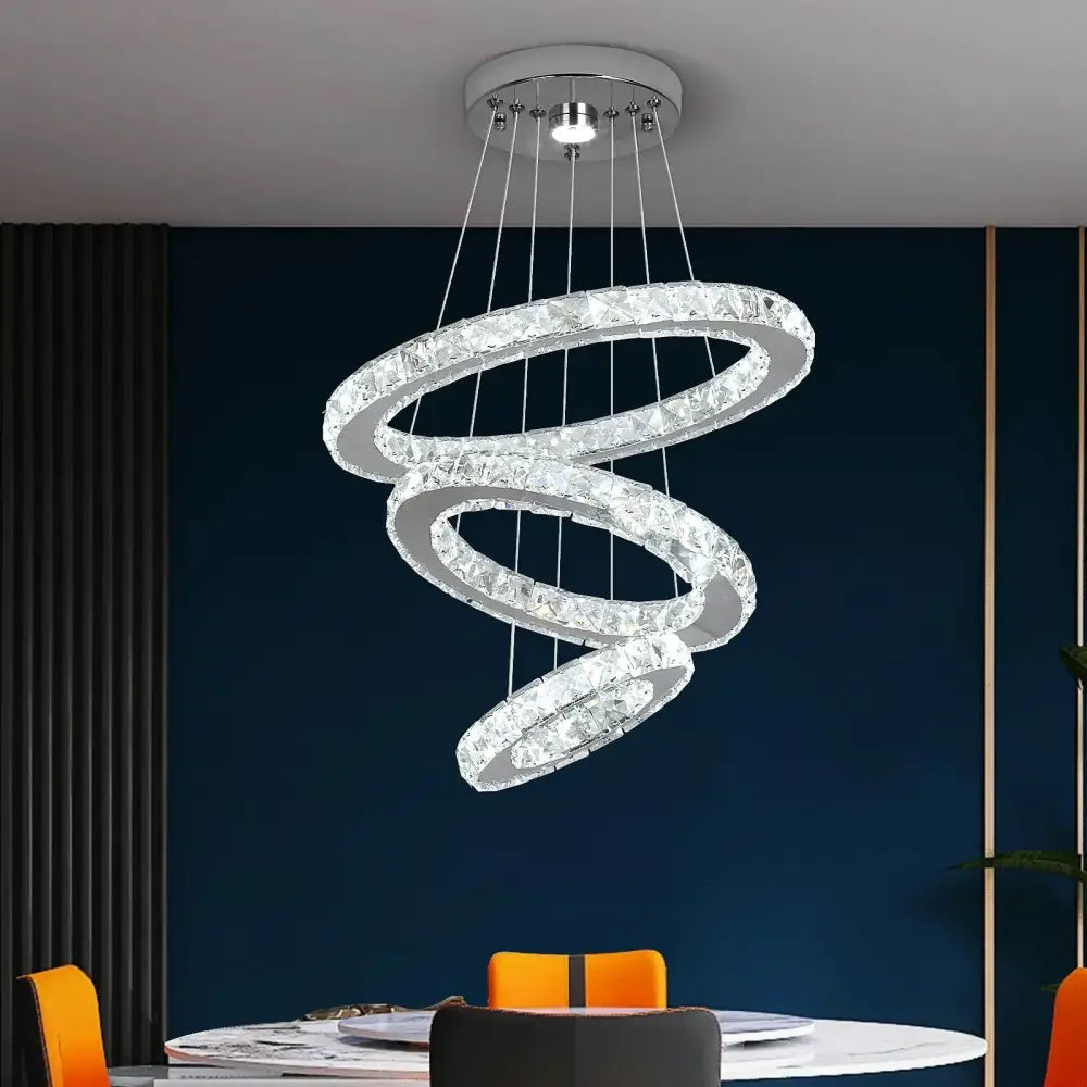 DecorBites crystal chandelier led pendant lighting with interlocking rings, clear crystals, and chrome finish for living room