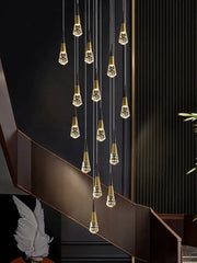 Golden-toned decorbites crystal chandelier led with faceted glass shades for elegant staircase and living spaces