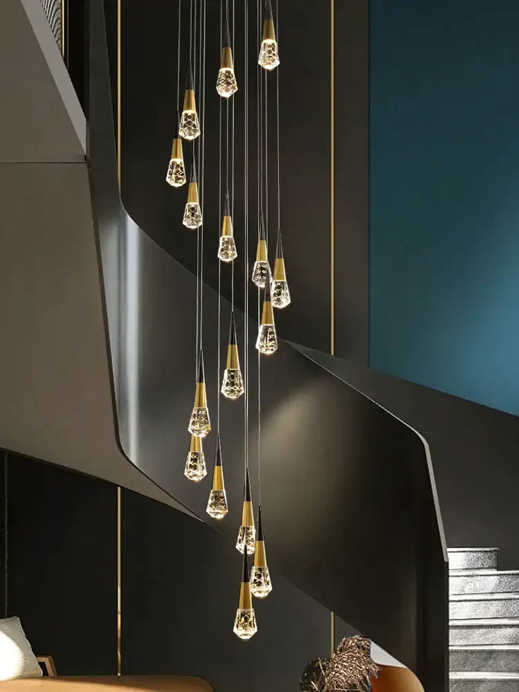 Golden-toned decorbites crystal chandelier led with sleek modern design hanging above staircase for elegant spaces