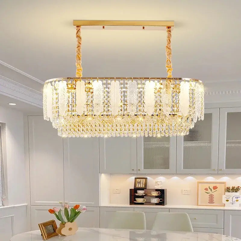 Elegant gold-toned decorbites crystal chandelier light with cascading clear crystal droplets and rectangular frame for home decor