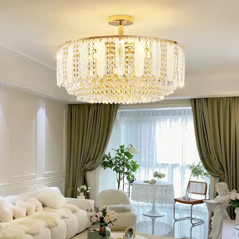 DecorBites crystal chandelier light with round multi-tiered gold-toned frame and cascading clear crystals for elegant decor
