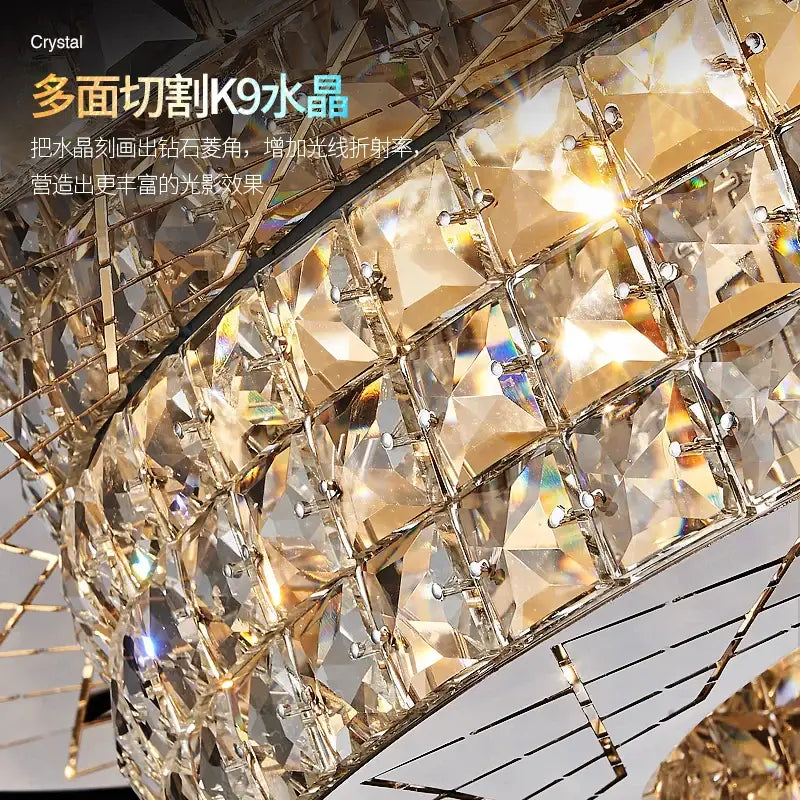 A luxurious gold-toned DecorBites crystal chandelier light with faceted k9 crystals for a luxury living room
