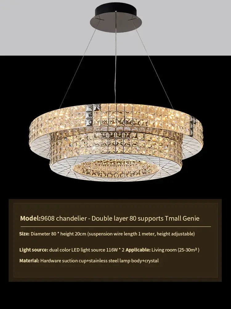A modern DecorBites crystal chandelier with stainless steel frame and cascading crystals featuring warm dual-color LED lighting