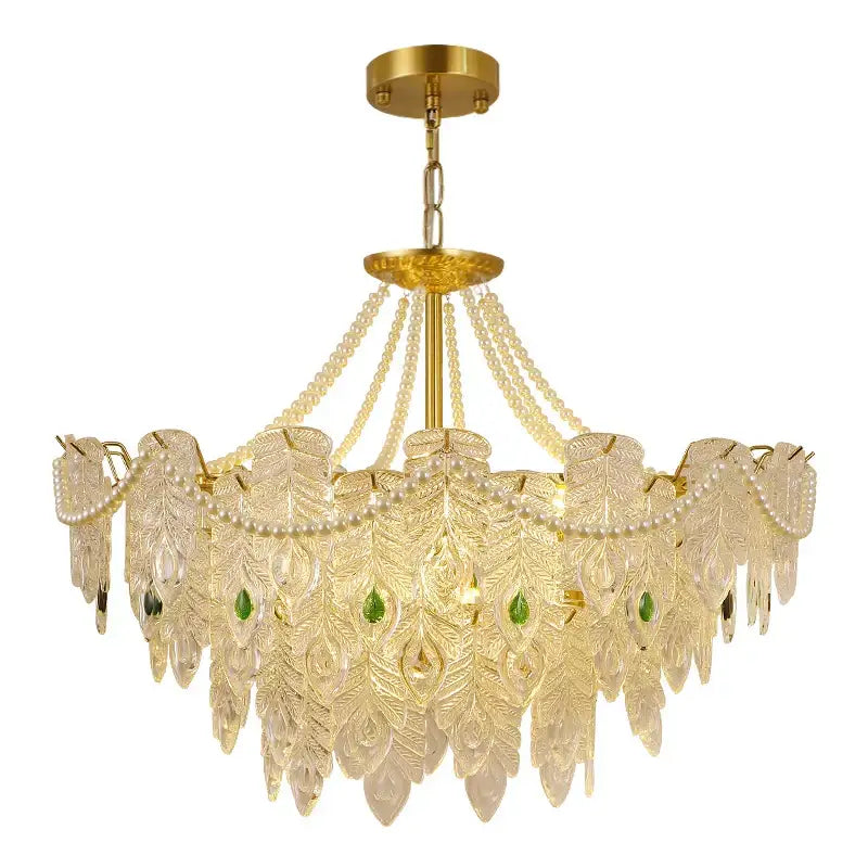 Elegant gold-toned DecorBites crystal chandelier light with cascading glass peacock feathers and green gemstones for luxury decor