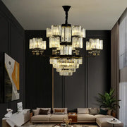Decorbites crystal chandelier light with black and gold frame and cascading clear glass prisms for luxury living spaces