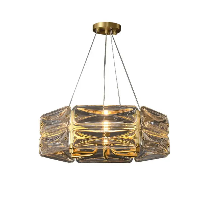 Gold-toned decorbites crystal chandelier with clear geometric glass blocks and brass accents for luxury lighting