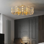 DecorBites crystal chandelier lighting with geometric faceted crystals and gold-toned metal for luxury home decor