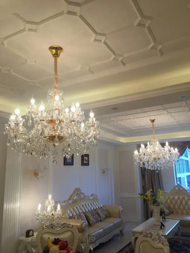 DecorBites crystal chandelier lighting with gold-toned metal accents and clear K9 multi-tier hanging crystals