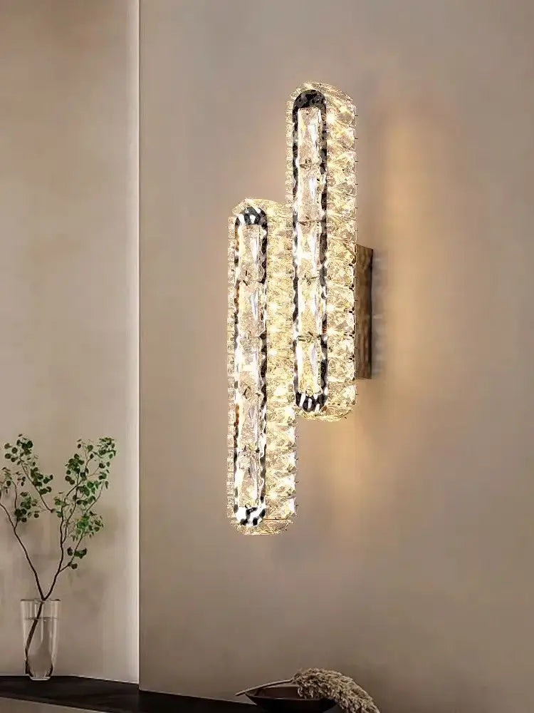 Modern DecorBites crystal chandelier with two intertwined crystal arms and black metal frames for living and dining rooms
