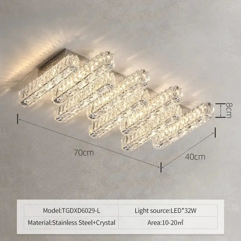 Modern decorbites crystal chandelier with sleek stainless steel frame and cascading clear faceted crystals for living room lighting