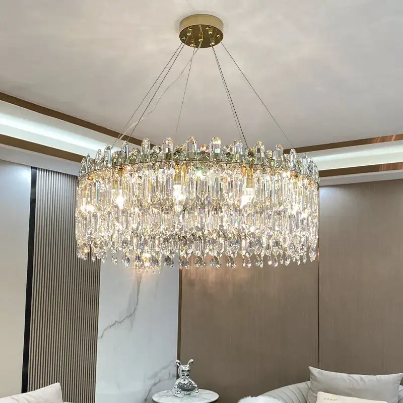 Luxurious decorbites crystal chandelier with gold-toned mount and faceted crystals for luxe living room decor