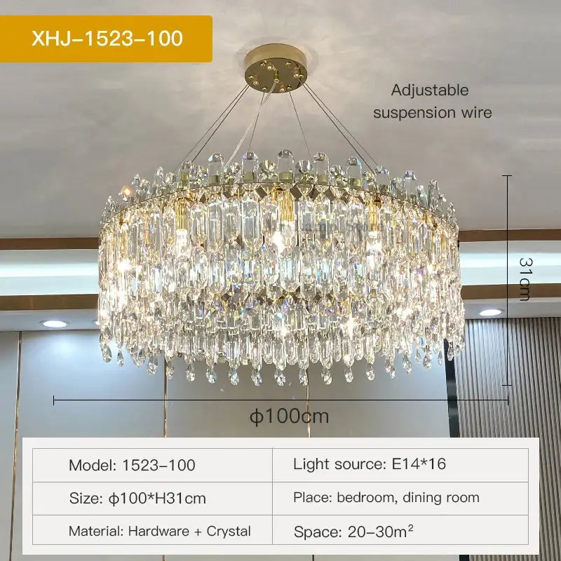 Gold-toned decorbites crystal chandelier with clear crystal droplets and prisms for luxe living room decoration