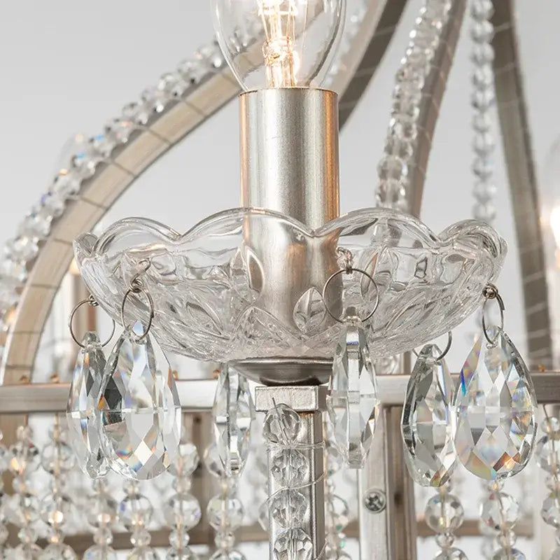 Silver-toned decorbites crystal chandelier pendant light with scalloped crystal bowl and teardrop-shaped crystals for luxe Nordic decor