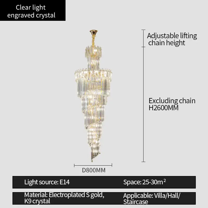 A tall DecorBites crystal chandelier with clear engraved crystal and electroplated gold accents for luxe stairwell lighting