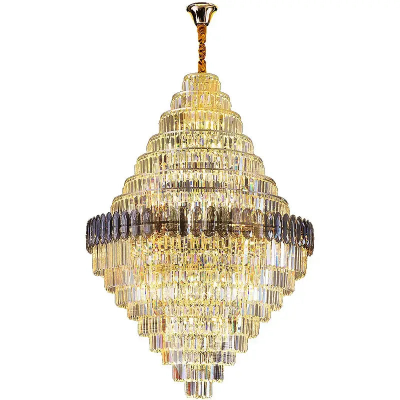 Golden tiered decorbites crystal chandelier with cascading rectangular prisms and central dark accent band for luxe stairwell lighting