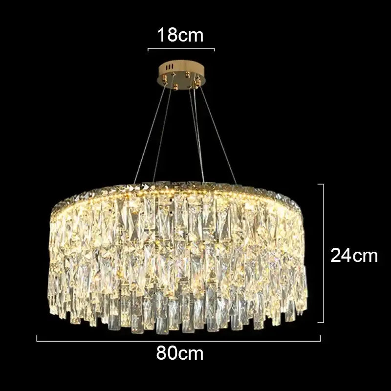 Decorbites crystal chandelier with gold-toned tiers of faceted prisms illuminated by warm led lights for luxury lighting