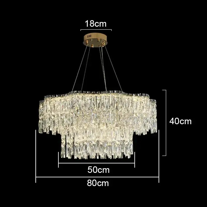 Decorbites crystal chandelier with cascading clear glass prisms and gold-toned mount for luxury bedroom lighting