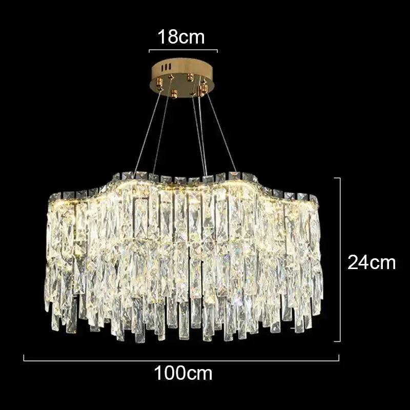 A decorbites crystal chandelier with a gold-toned mount and cascading clear faceted glass prisms for luxury lighting