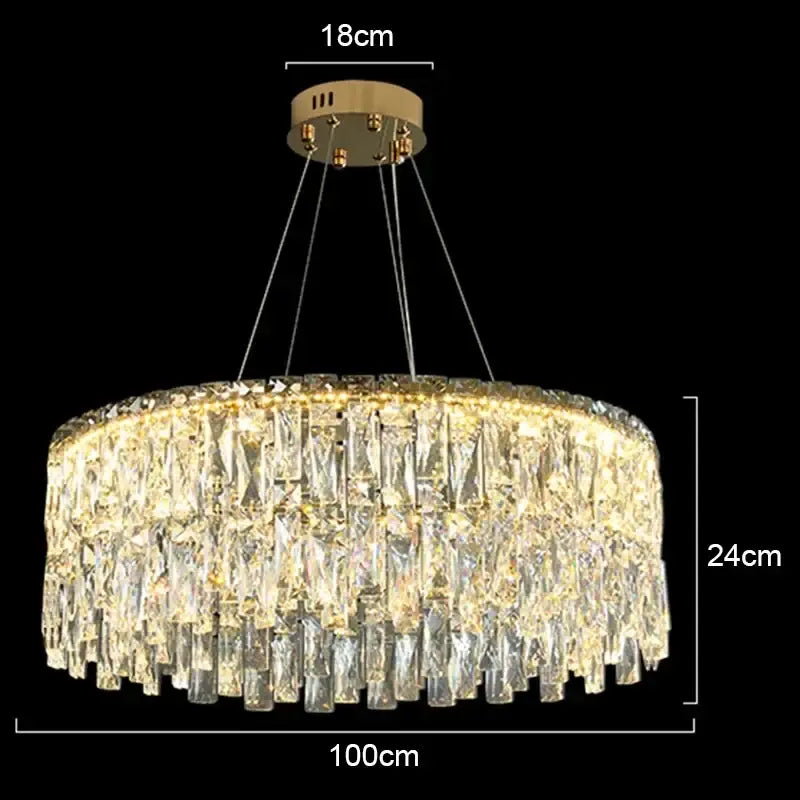 A decorbites crystal chandelier with gold tone and cascading clear crystal prisms for luxury bedroom lighting