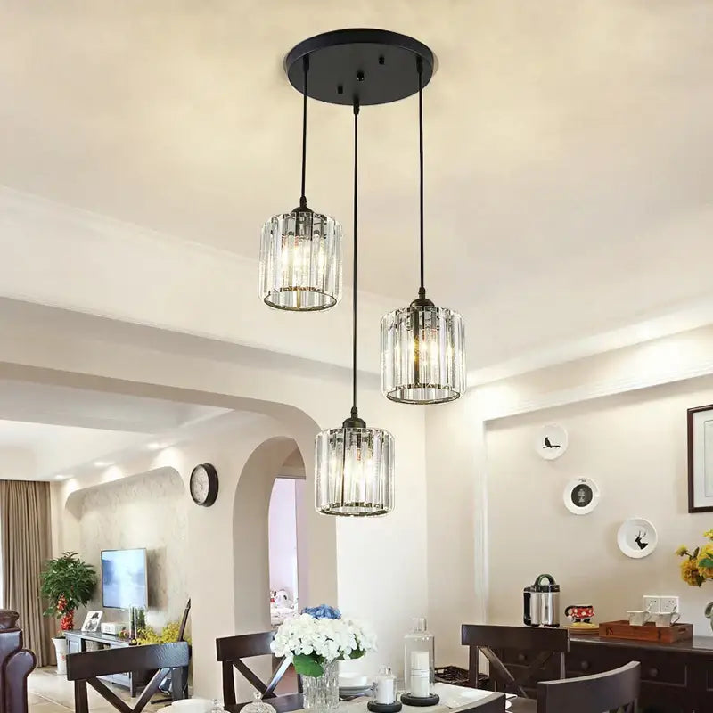 Three black pendant lights with clear ribbed glass shades from decorbites crystal chandelier for indoor lighting