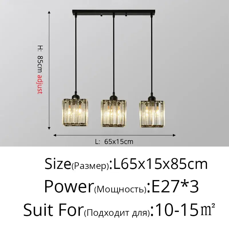 Black metal bar pendant light with three hanging glass prisms and warm bulbs in decorbites crystal chandelier design