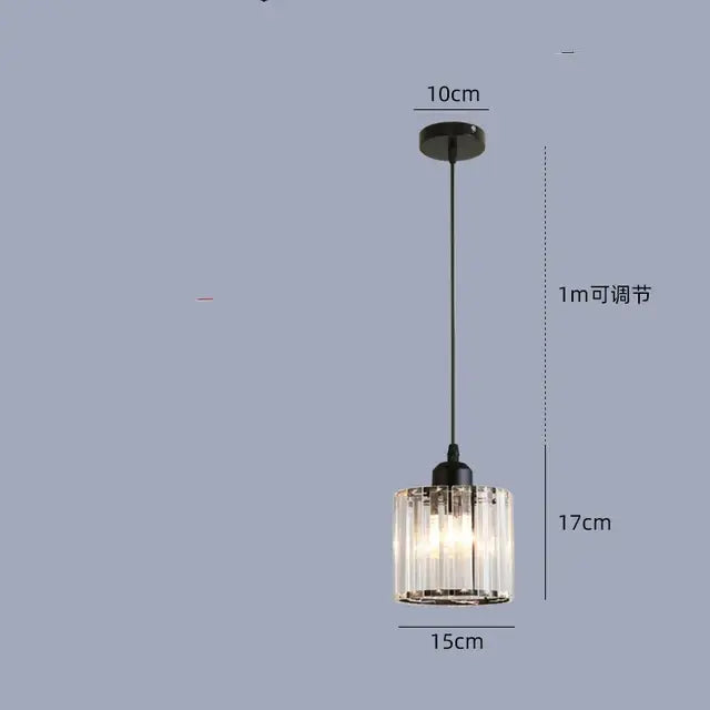 A modern black pendant light with cylindrical glass shade and adjustable chain from DecorBites crystal chandelier series