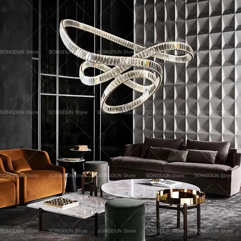 A modern DecorBites crystal chandelier with intertwined crystal rings as a luxury designer light for elegant spaces